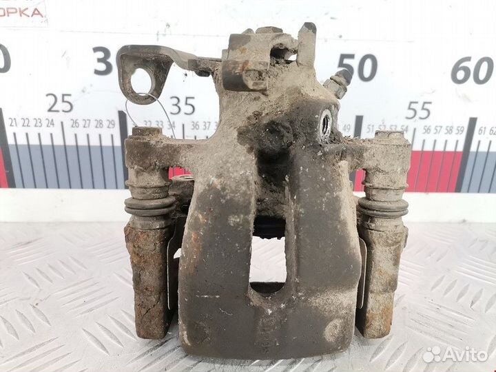 Суппорт задний правый для Opel Zafira A 93177448