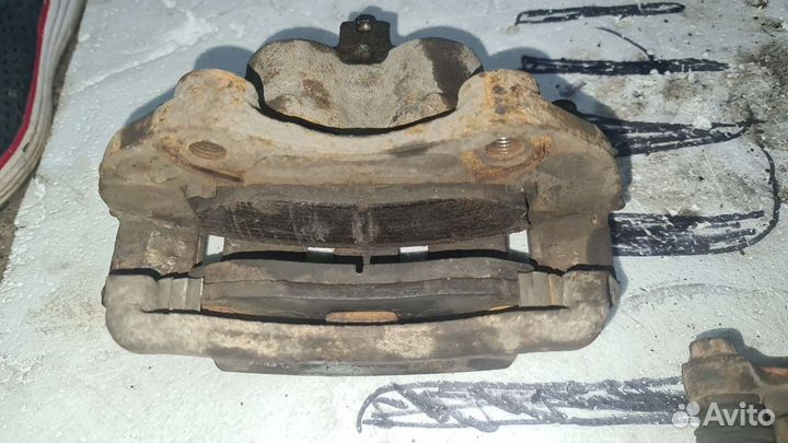 Тормозные супорта нисан сканлайн R33 R34