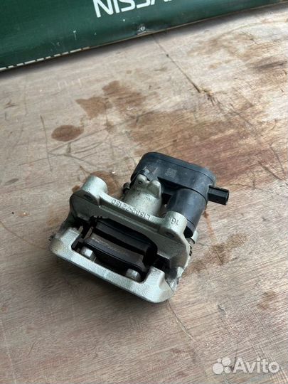 Суппорт тормозной задний левый Kia Sportage 5 G4KN