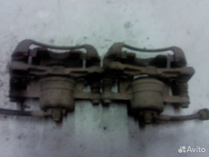 Суппорт передний Chevrolet Aveo T250