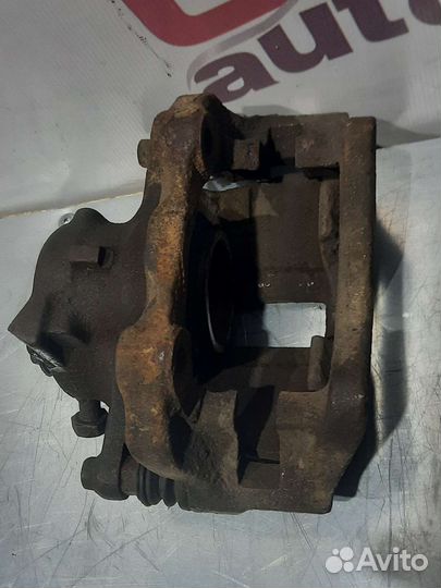 Суппорт тормозной VW Golf 3