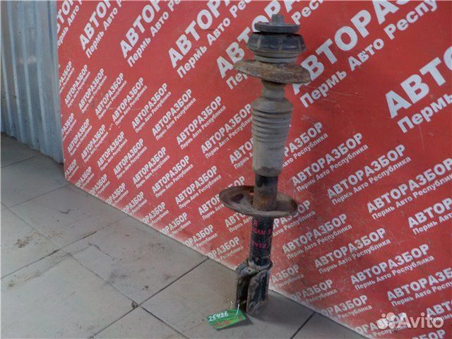 Амортизатор передний правый Renault Logan LS12