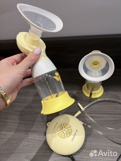 Молокоотсос medela swing maxi flex