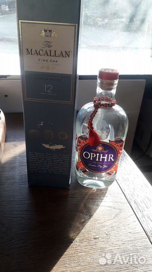 Пустые коробки и бутылки от виски