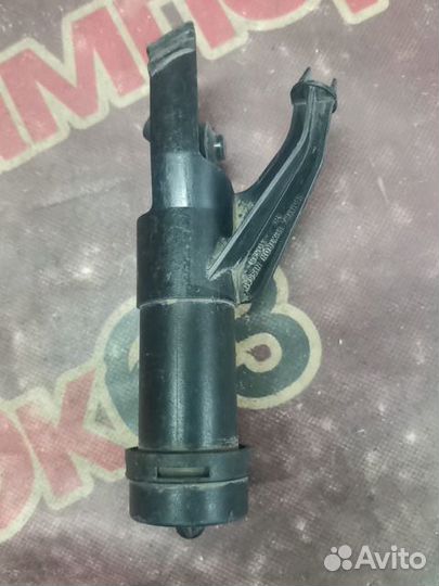 Форсунка омывателя фары Nissan Note