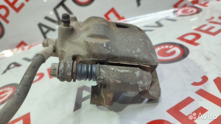 Суппорт тормозной передний правый Nissan Wingroad