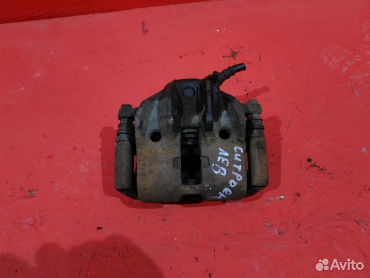 Суппорт передний левый Ситроен Ксара Пикассо