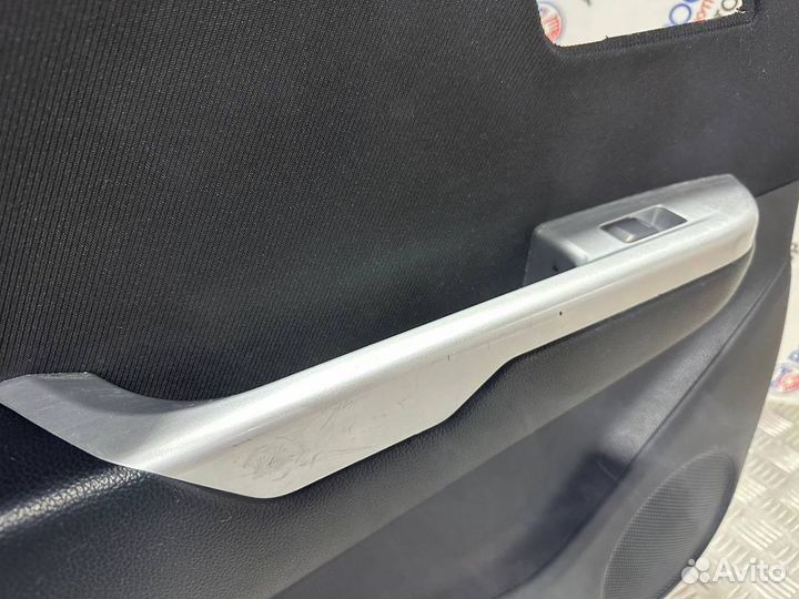 Обшивка двери Kia Rio 3