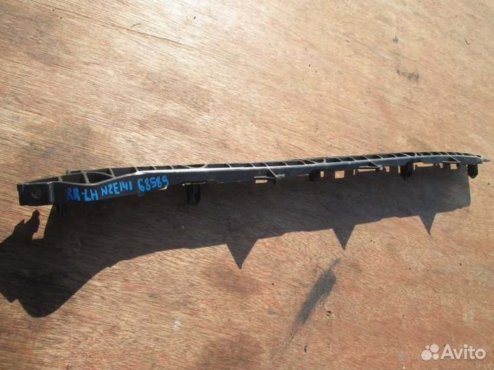 Крепление бампера заднее левое Toyota Corolla