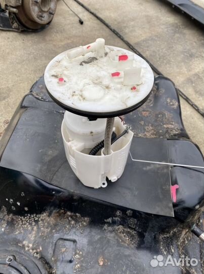 Бензонасос Мицубиси Лансер 10