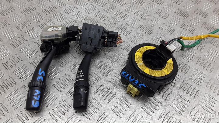 Переключатель поворотов подрулевой Kia Carnival