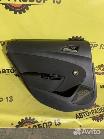 Обшивка задней левой двери Opel astra J 5D