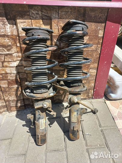 Стойки передние Форд Фокус 2