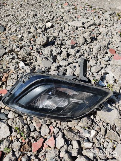 Противотуманная фара левая Opel Astra j