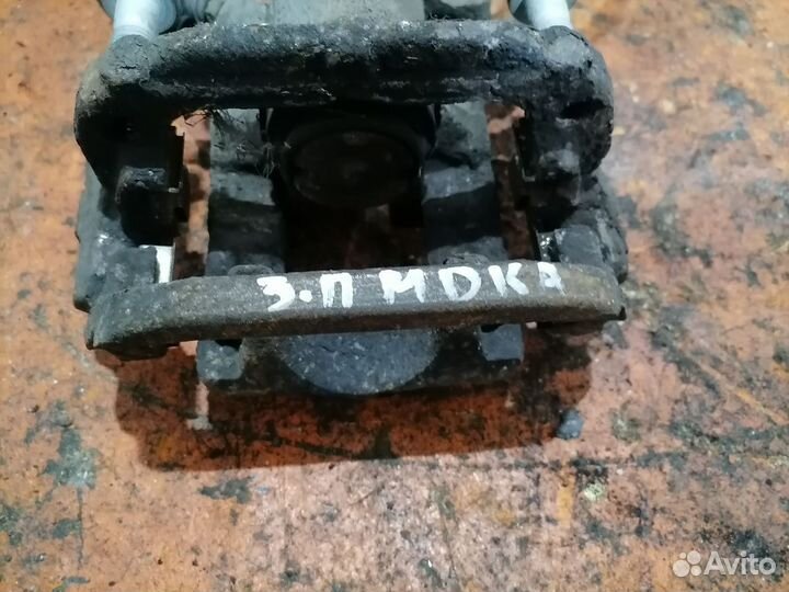 Суппорт тормозной задний правый Opel Mokka