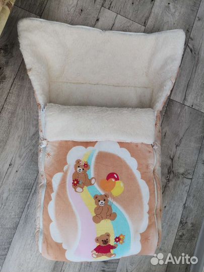 Зимний конверт в коляскуна овчине