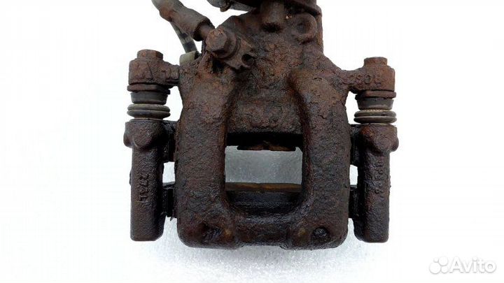 Суппорт тормозной задний левый Volkswagen Jetta A5