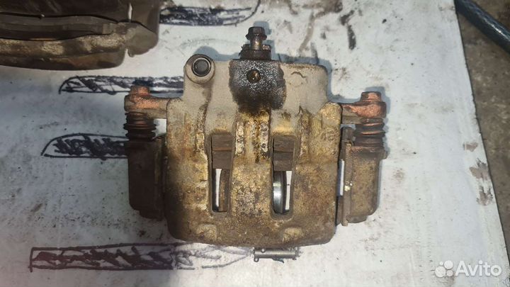 Тормозные супорта нисан сканлайн R33 R34