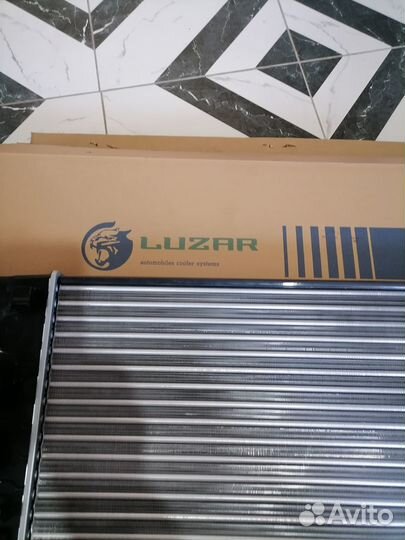 Радиатор охлаждения двиготеля на opel astra j