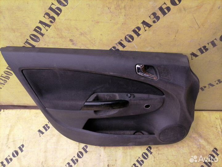 Обшивка двери передней левой Opel Corsa D