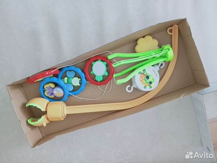 Детский мобиль в кроватку музыкальный