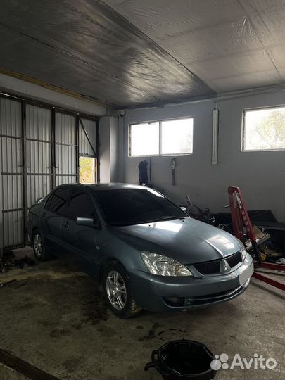 Mitsubishi Lancer 1.6 МТ, 2006, 250 000 км