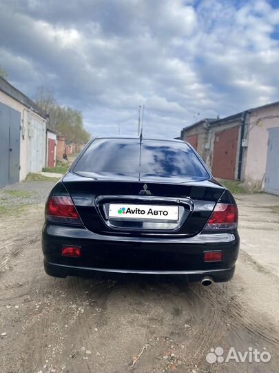 Mitsubishi Lancer 1.6 AT, 2009, 320 000 км