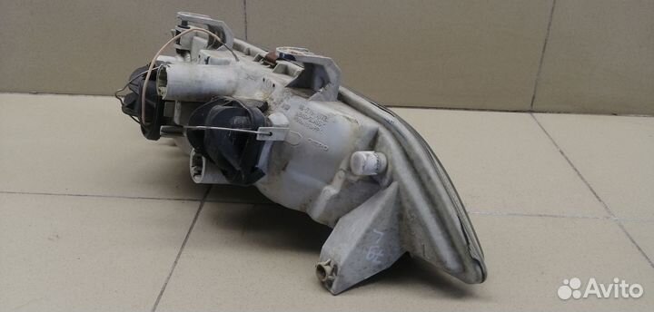 Фара левая Primera P11E 1996-2002