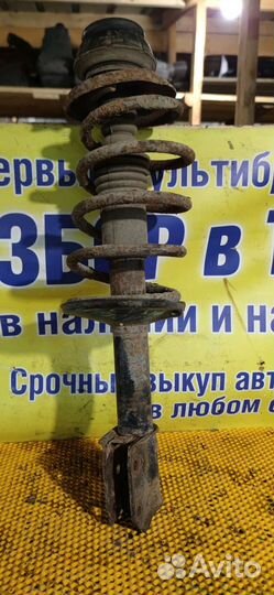 Стойка амортизатора переднего левого Renault Logan