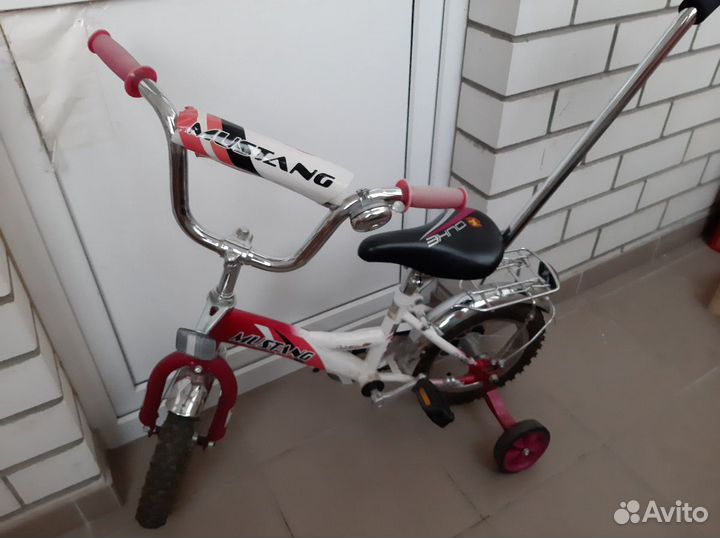 Велосипед четырехколесный с ручкой