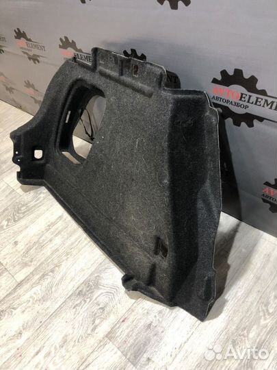 Обшивка багажника левая Мазда 3 BL хэтчбек