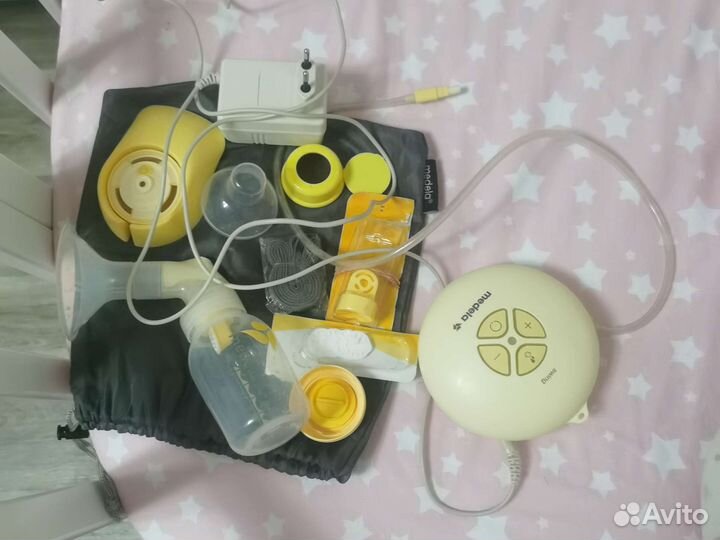 Молокоотсос medela