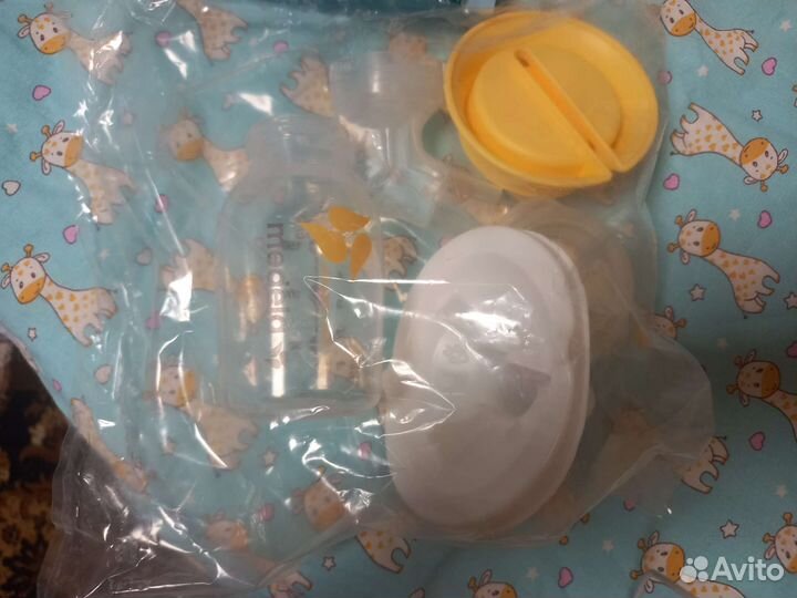 Молокоотсос medela ручной