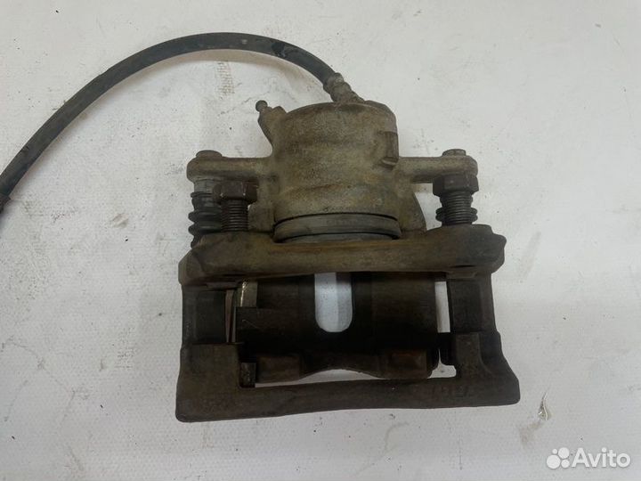 Суппорт тормозной передний левый Лада Largus R90