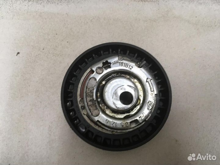 Ролик-натяжитель ремня грм Logan 2005-2014