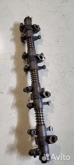 Ось коромысел газ