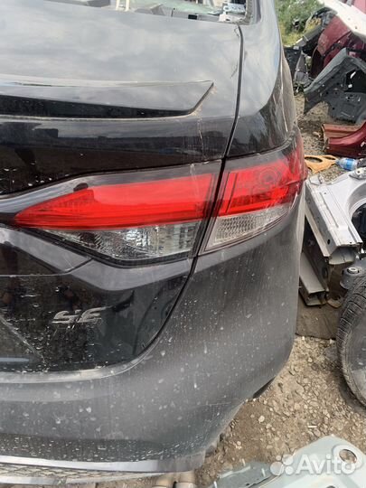 Блок задних фонарей USA Toyota Corolla SE E210