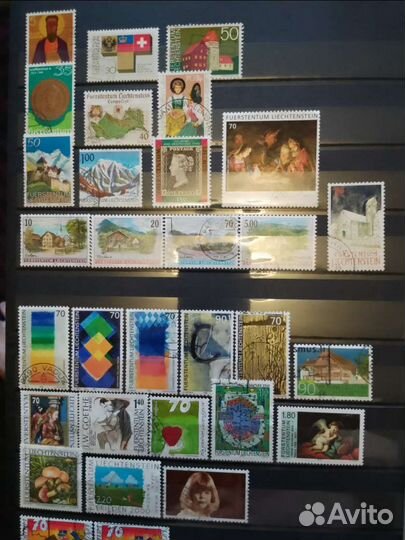 Почтовые марки в альбоме