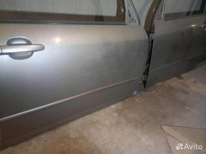 Двери Toyota Corolla Spacio NZE121