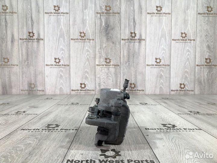 Суппорт задний левый Kia Sorento 2 внедорожник