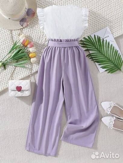 Футболка с оборками и брюки