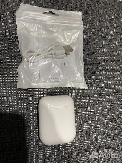 Беспроводные сенсорные наушники новые