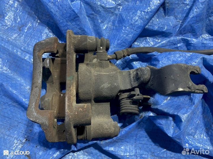 Суппорт на mazda capella gwer