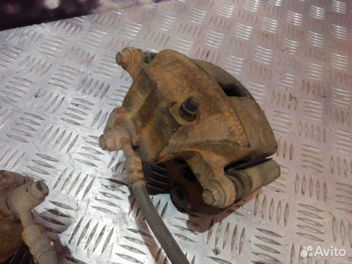 Суппорта передняя Nissan Almera N16 1.5 2000-2006