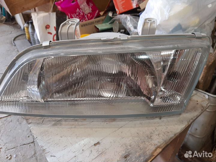 Фара Nissan Primera P11 левая