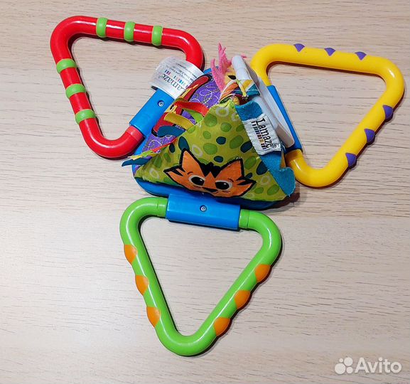 Подвесные игрушки lamaze taf toys