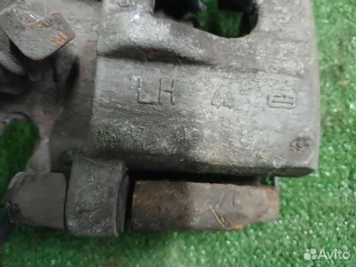 Суппорт задний левый Ford Focus 3