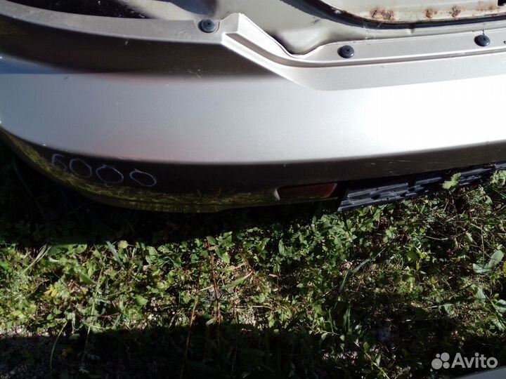 Бампер задний Kia Spectra