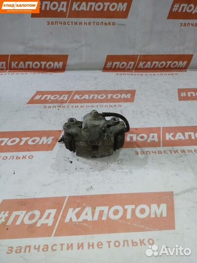 Суппорт тормозной передний левый Nissan Teana J32