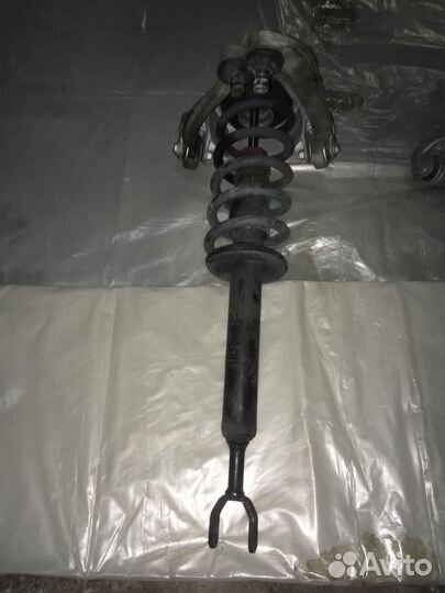 Задний амортизатор Audi A6 2005